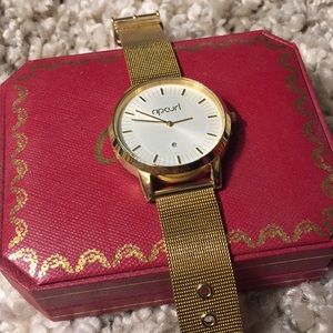 Gold RipCurl watch
