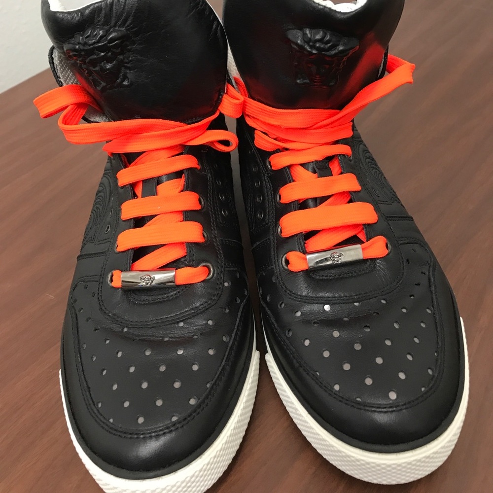 Black Versace lace ups.