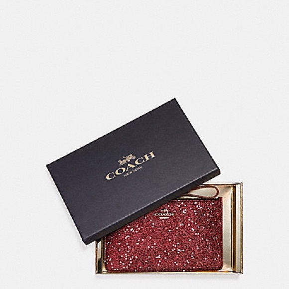 Coach Handbags - NWT Coach stunning red star wristlet!!