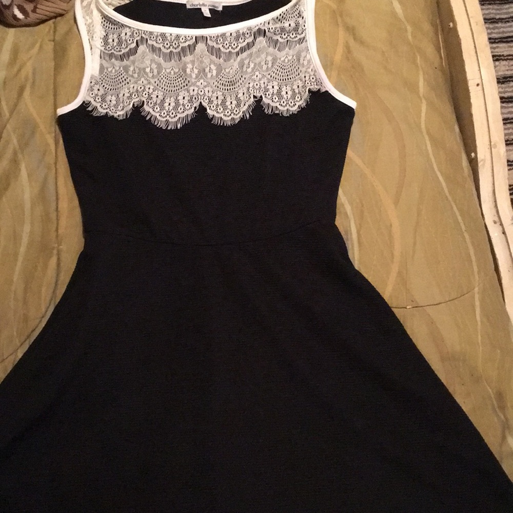 Black dress with white lace around the neck