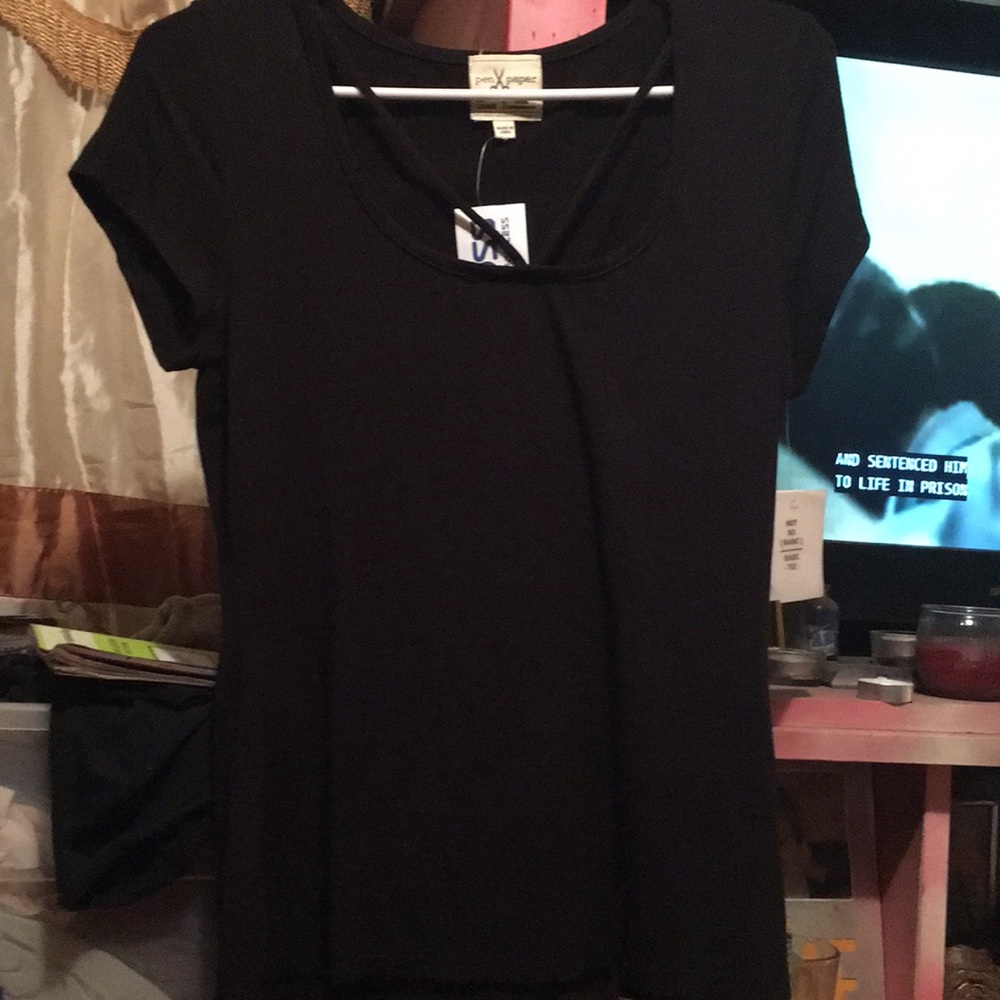 Black T with two strings tight in the front