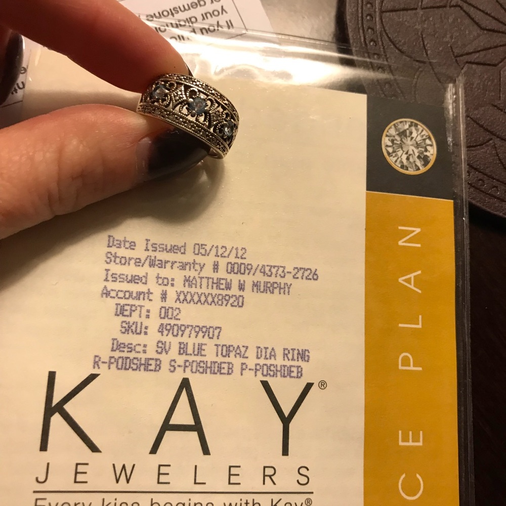 Blue topaz diamond ring