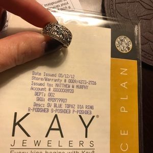 Blue topaz diamond ring