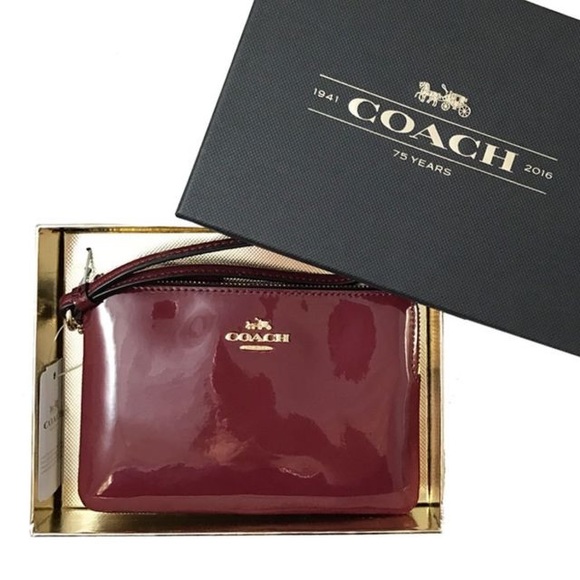 Coach Handbags - NWT Coach beautiful burgundy wristlet!!