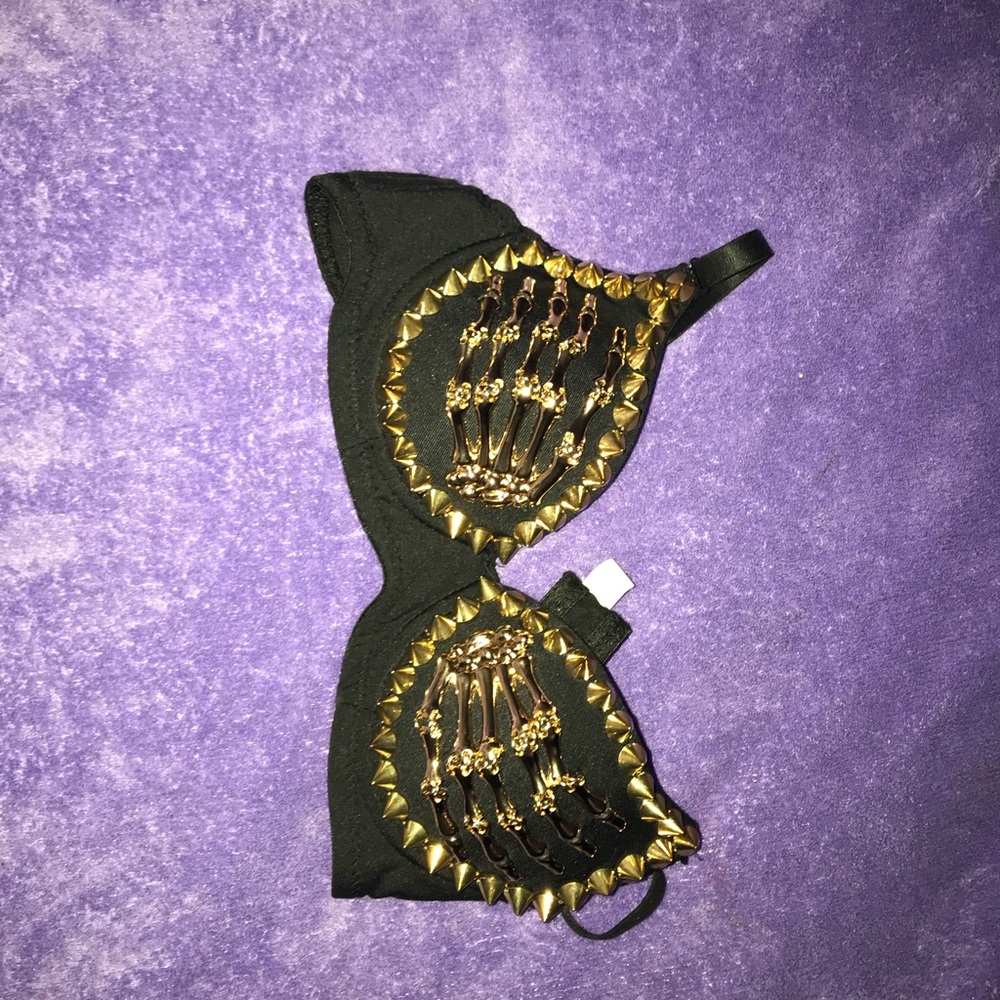 Gold and black skeleton bra