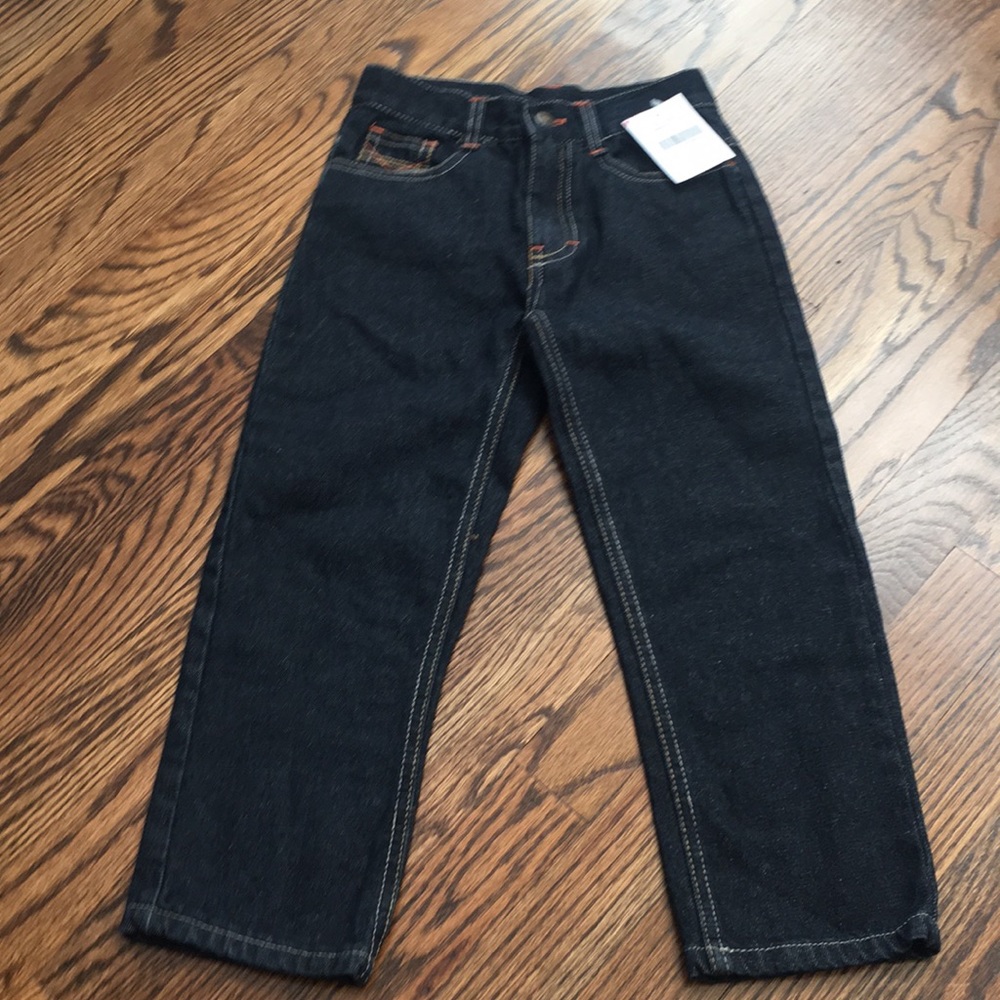 NWT Toddler size 4 dark jeans.