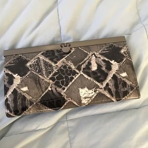 Like new! BeBe black and white animal print wallet