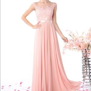 Long beaded gown with floral appliqué