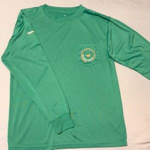 Green long sleeve shirt.