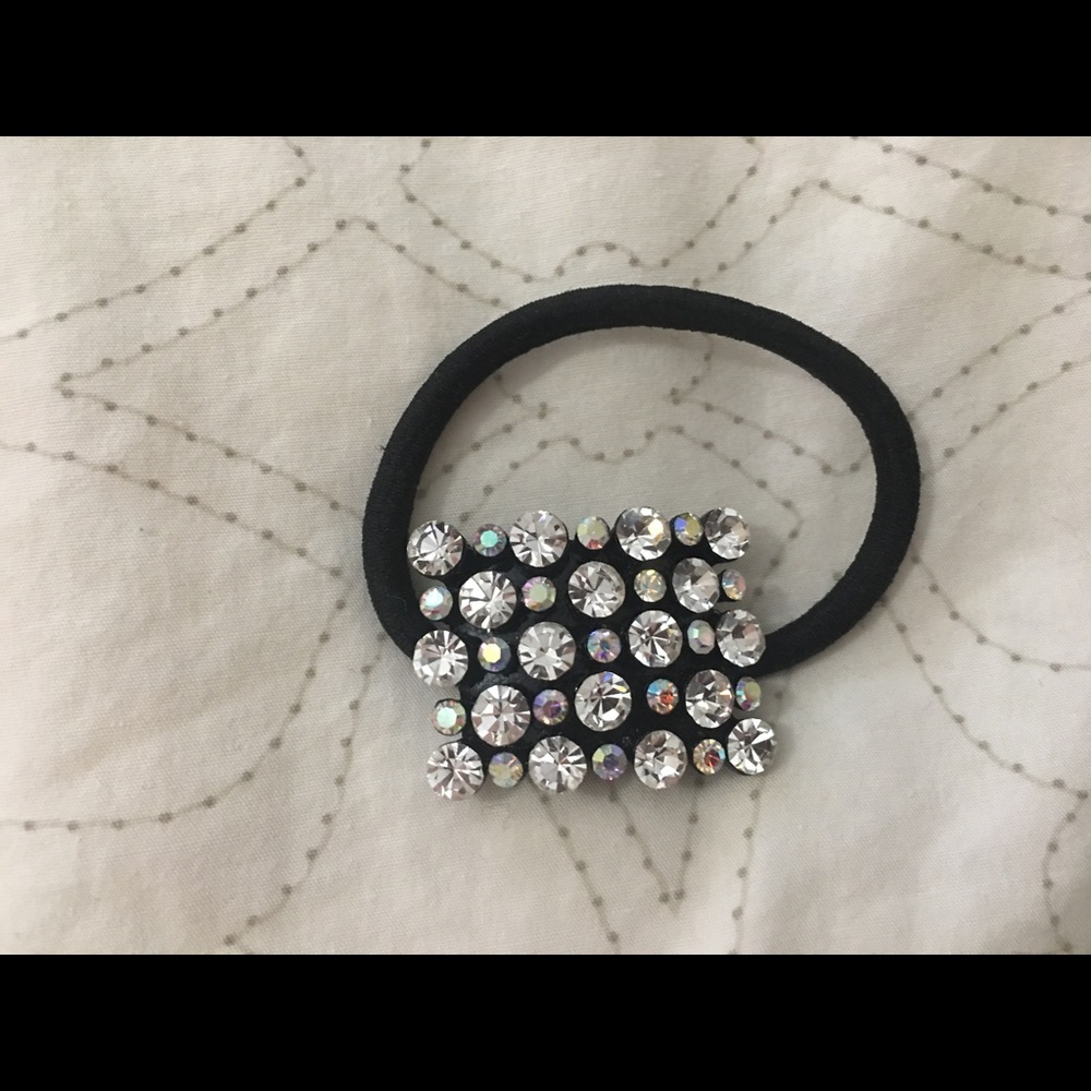 Bejeweled hair elastic.