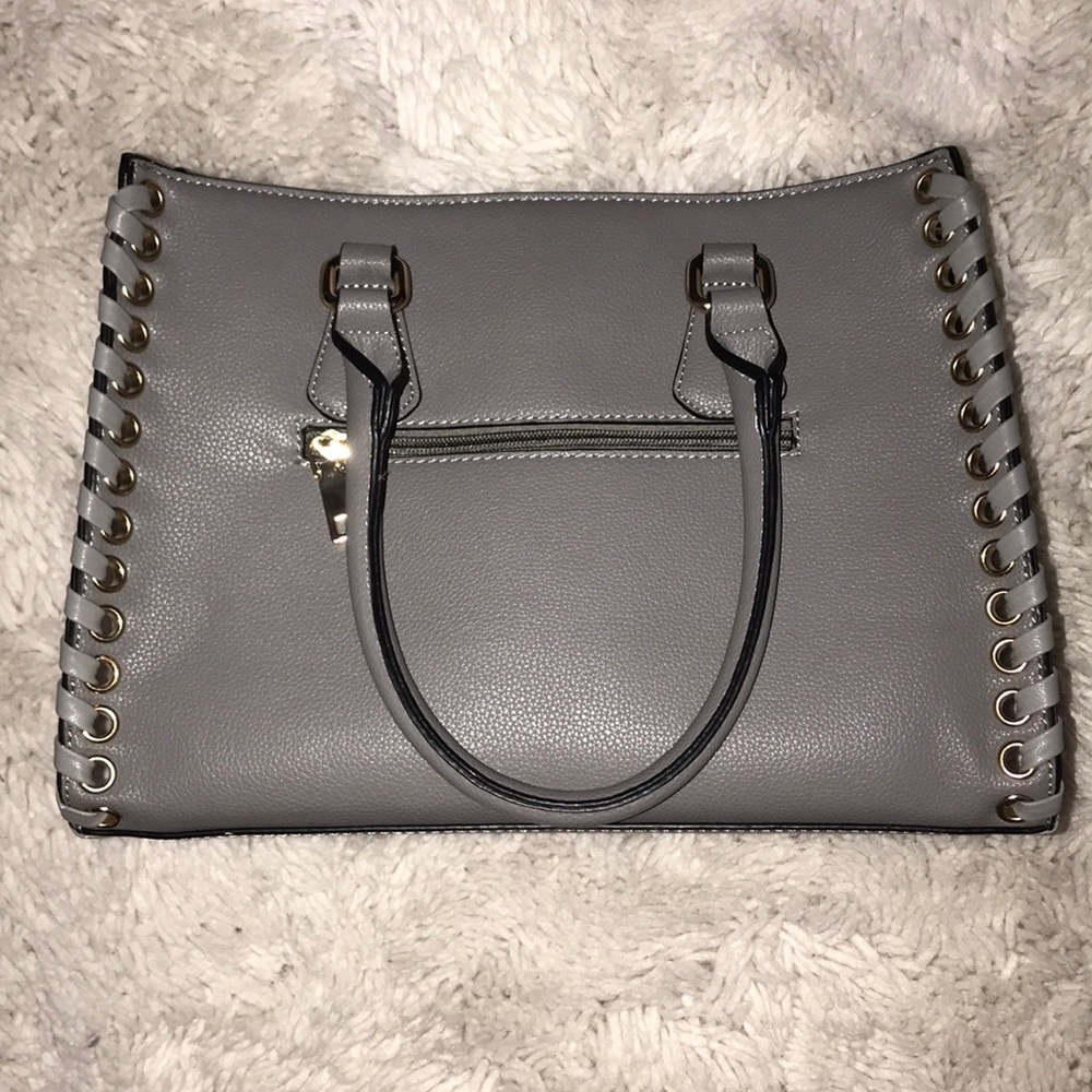 never used- grey leather purse