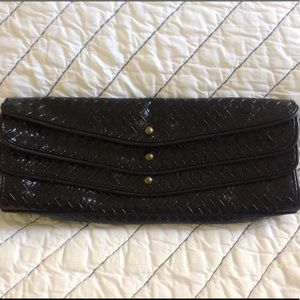 Woven leather wide clutch