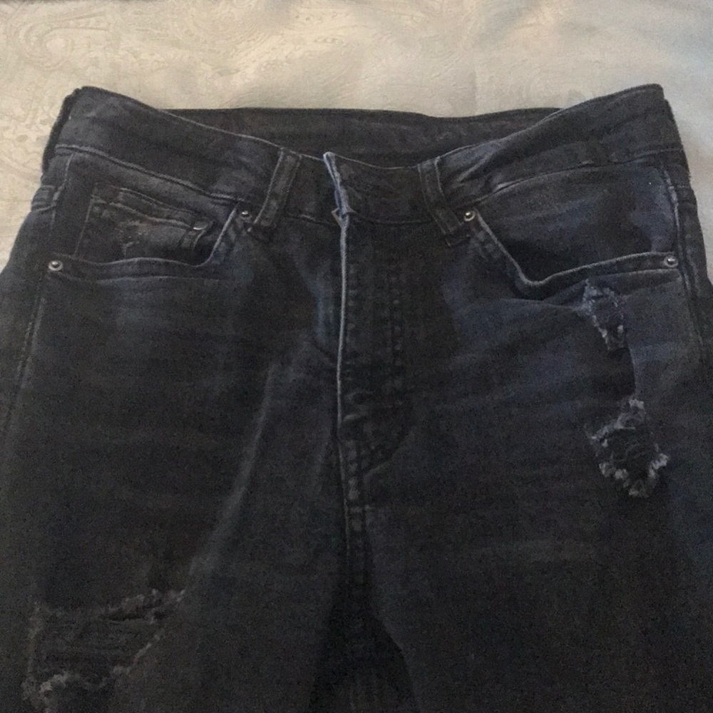 High waisted distressed black jeans