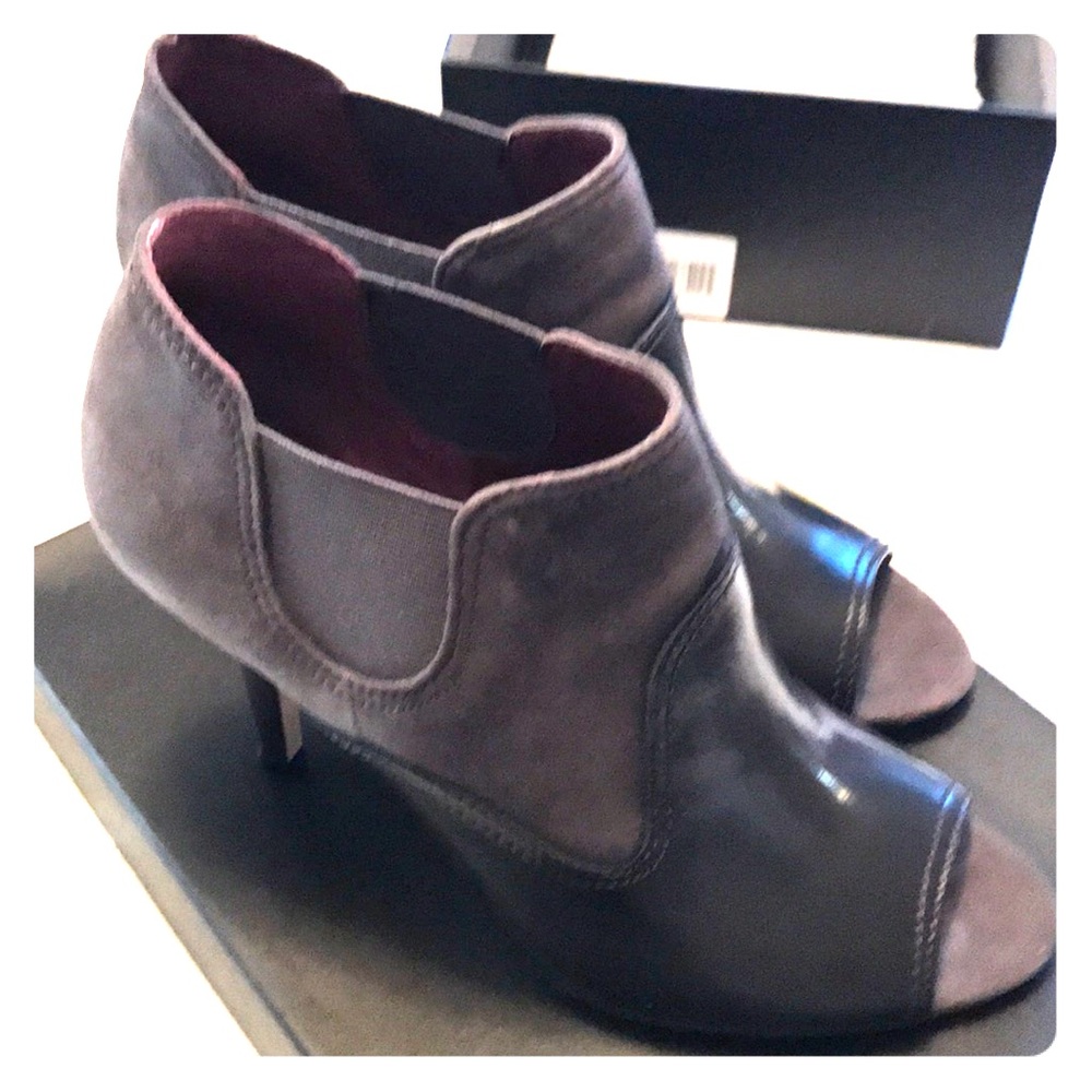 T Tahari “Linda” leather open toe booties.