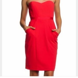 Red BCBG strapless dress new without tags.