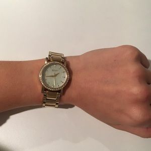 DKNY gold watch with crystal detail