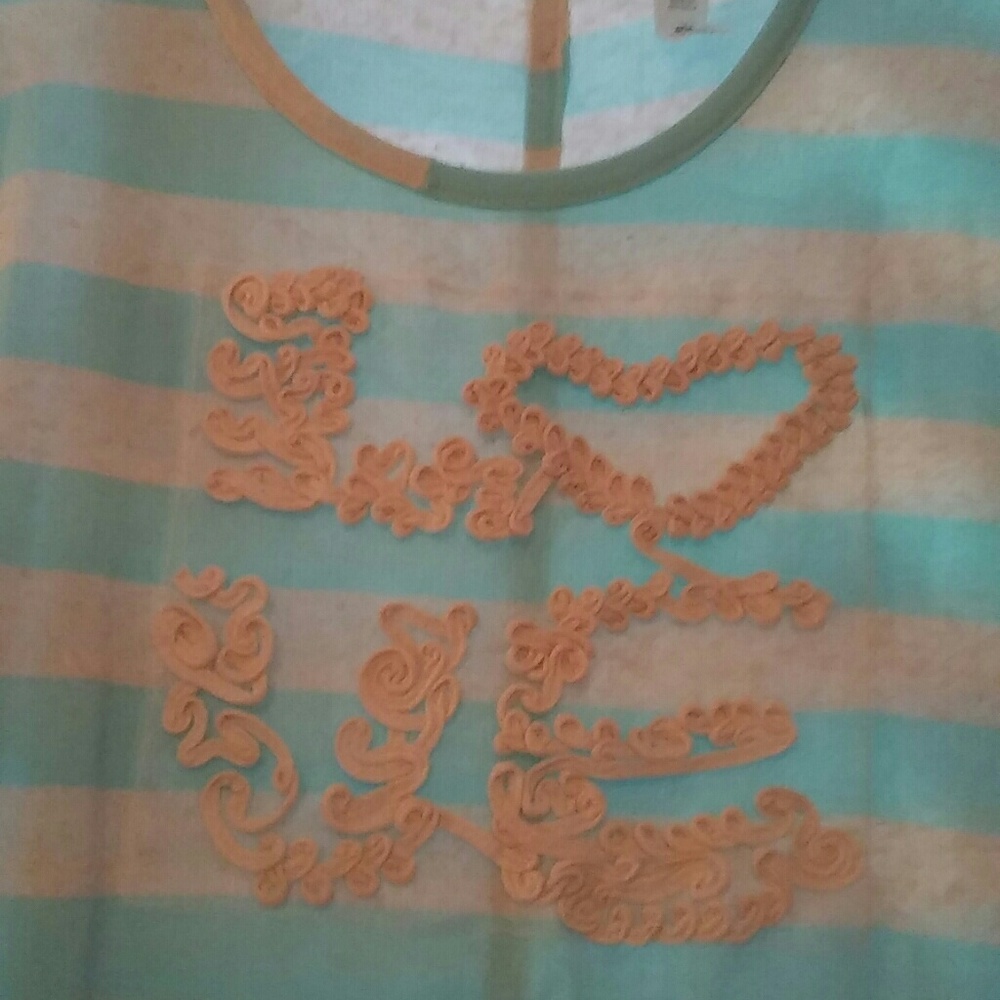 Super cute casual "LOVE" top. Plus size never worn