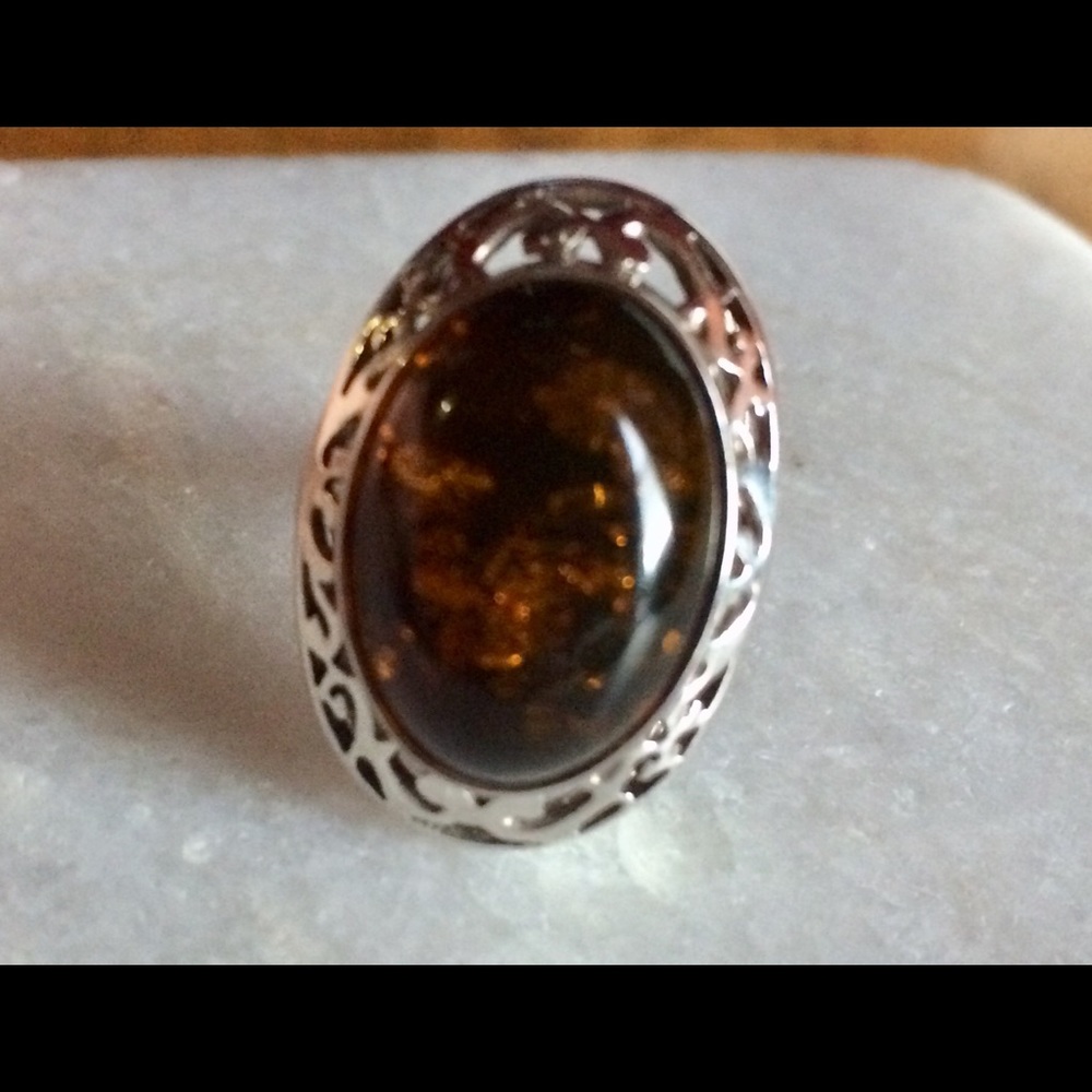 Sterling silver amber ring.