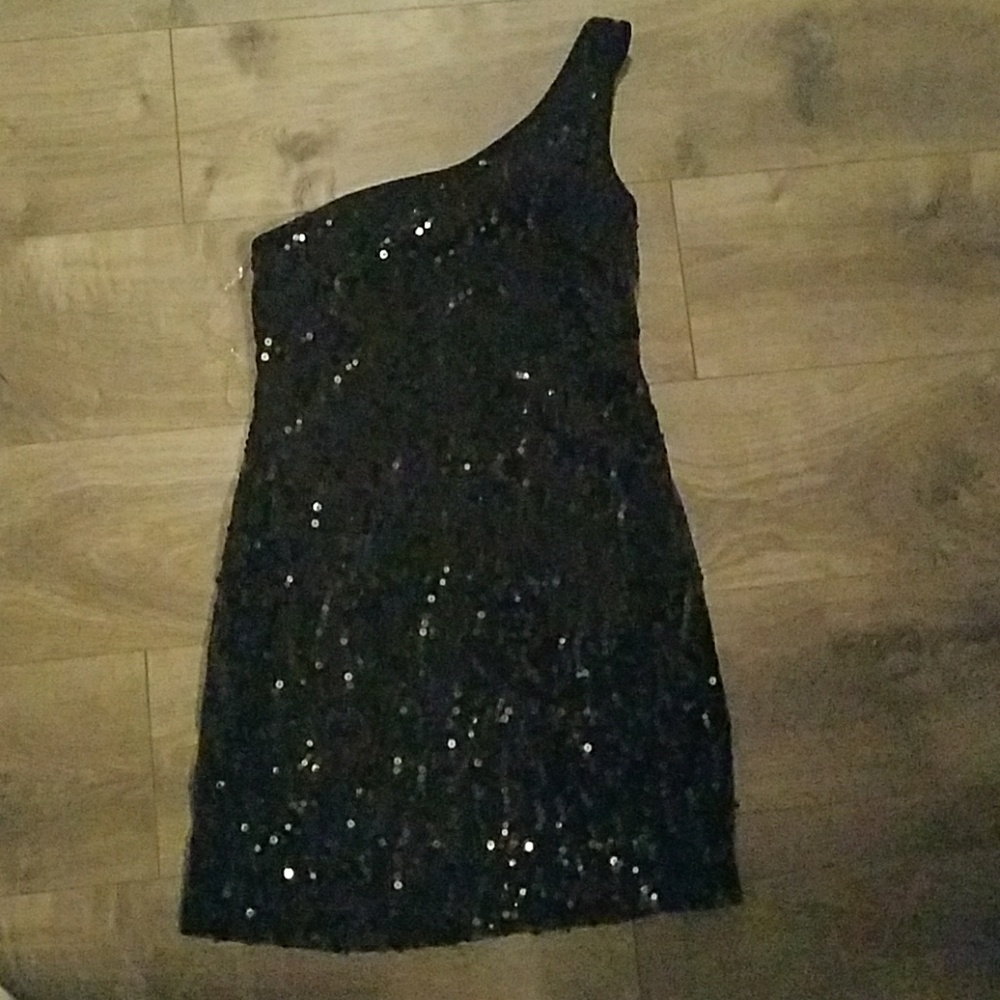 Black shimmery dress.
