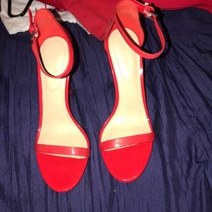 Red Aldo high heels
