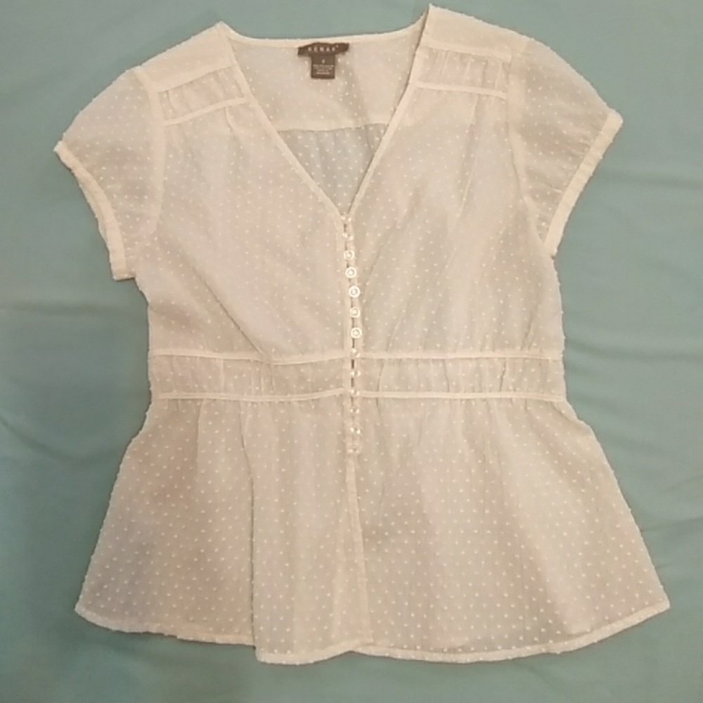 Cream dotted Swiss peplum top
