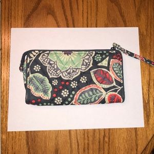 Front zip wristlet in nomadic floral