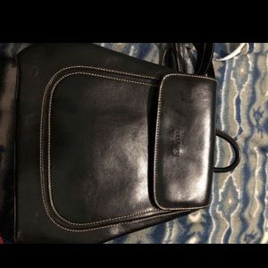 Black leather mini book bag or a satchel.