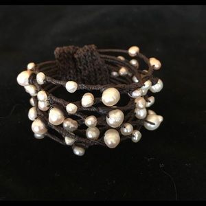 Cuff bracelet with “floating” fresh water pearls
