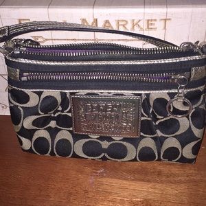 Coach clutch wristlet