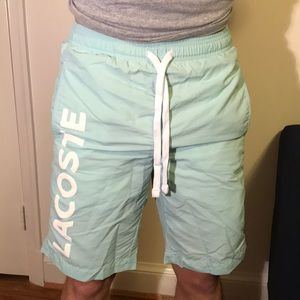 Green Lacoste bathing suit