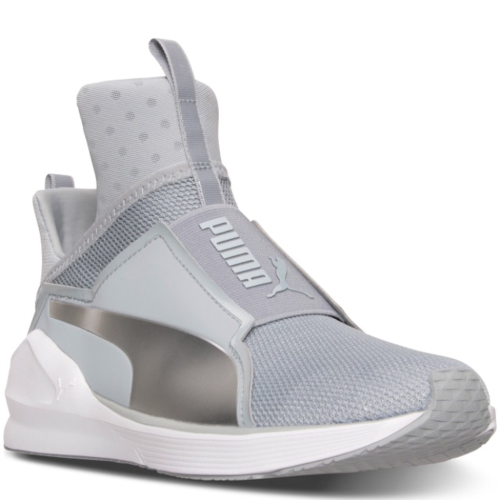 Kylie Jenner’s high top Silver Pumas