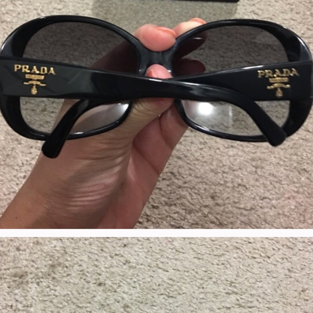 Prada spr03m black sunglasses with gold logo