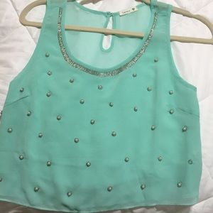A Tiffany blue color crop top