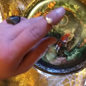 A .51carat gold solitaire ring