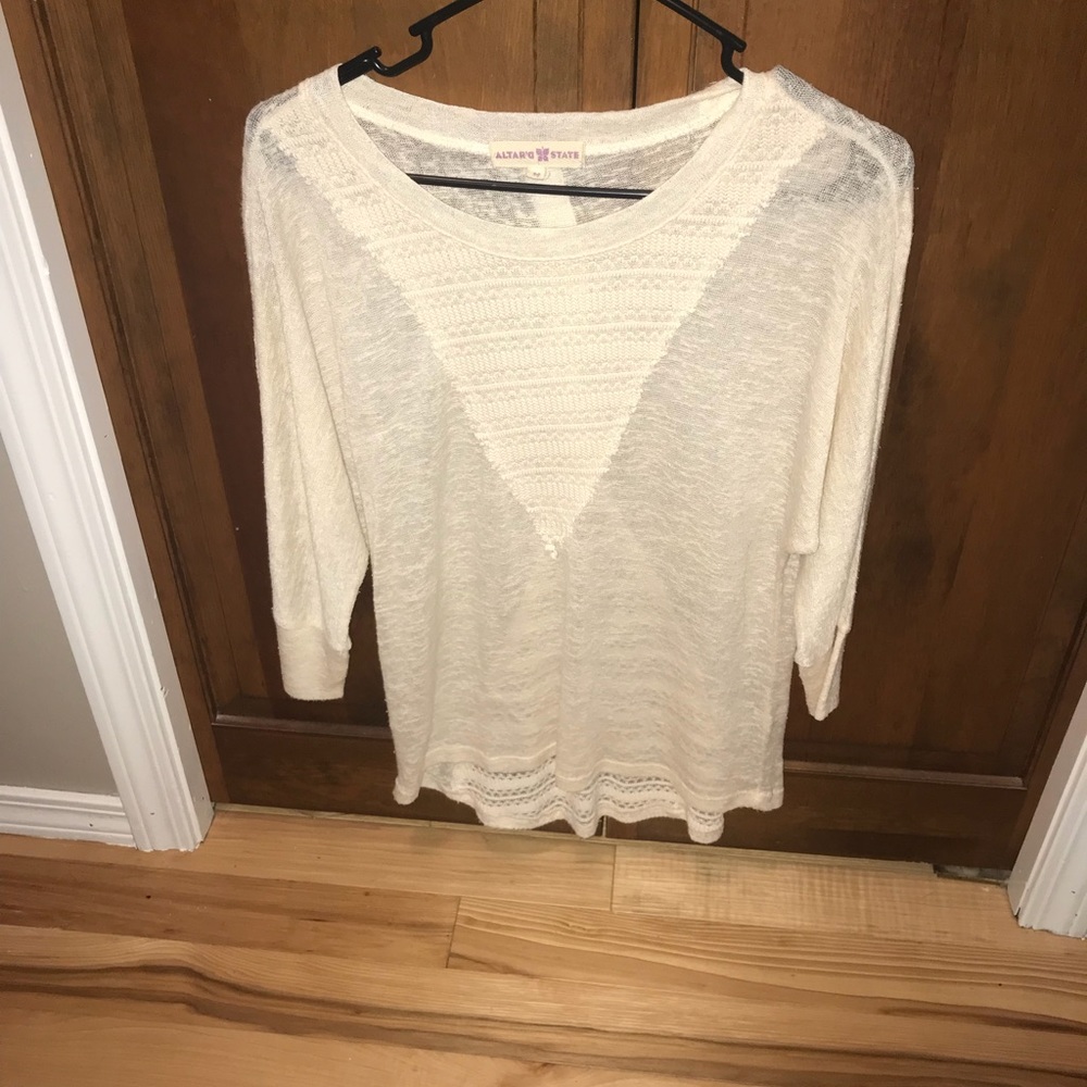 3/4 length light sweater.