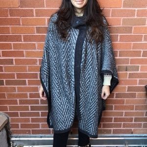 Grey knitted cape from The Outnet