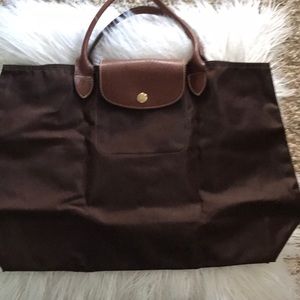 Longchamp Medium Le Pliage Medium Top Handle tote.