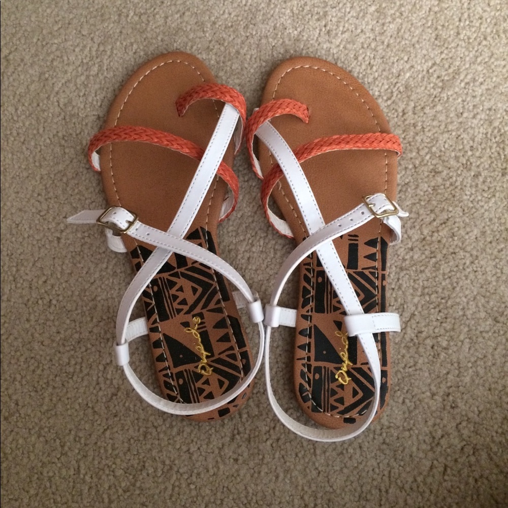 Orange and white sandals