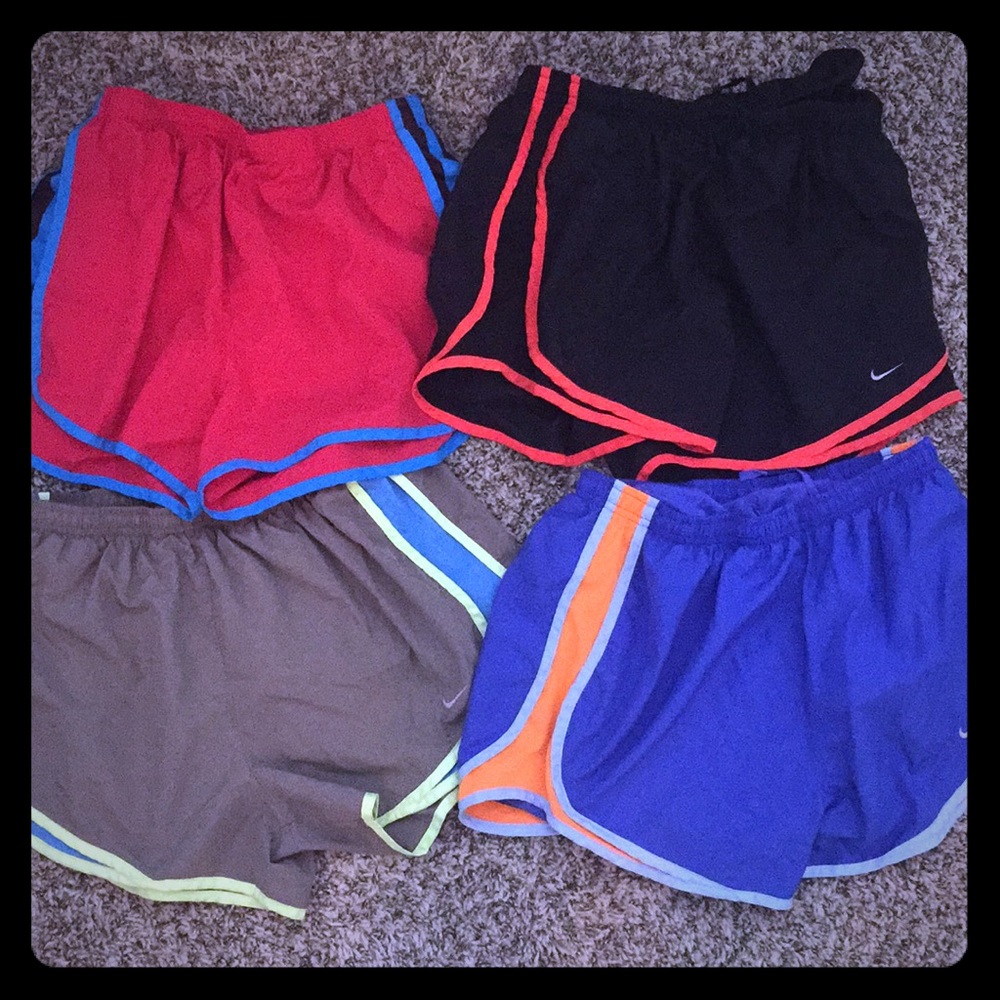 Four pairs of  Nike running shorts