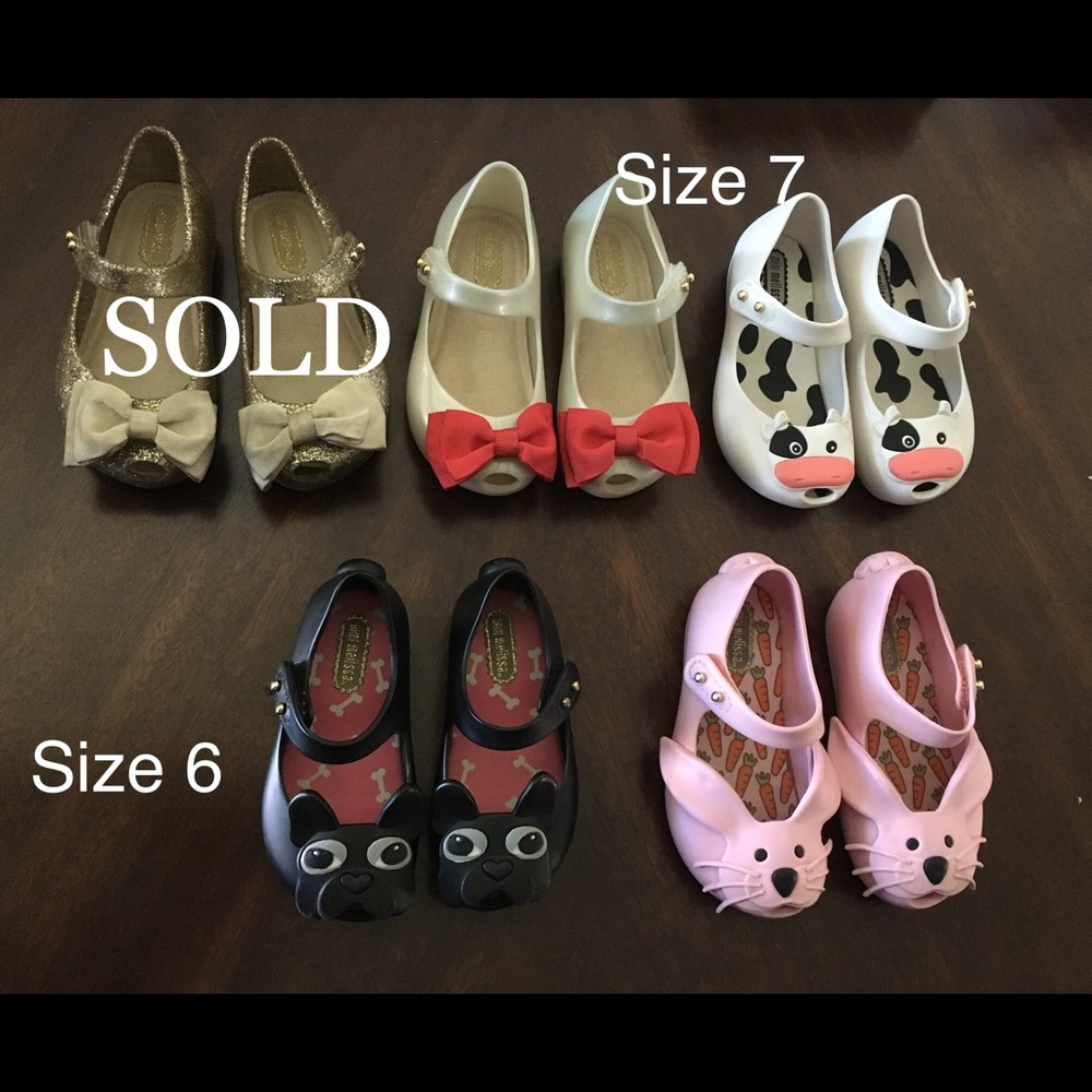 Mini Melissa Ultragirl white w/ red bows size 7