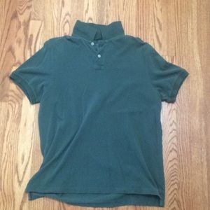 Green polo by J Crew. Good condition.