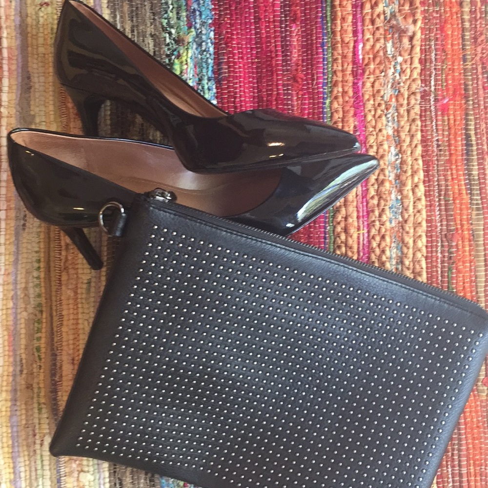 Joyus studded zip clutch