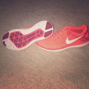I’m selling orange Nike shoes