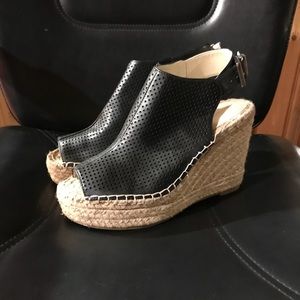 Kennth Cole. New only tried on