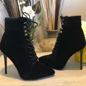 Black lace up high heel boots