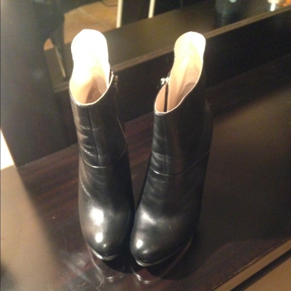Leather high heeled platform ankle boots
