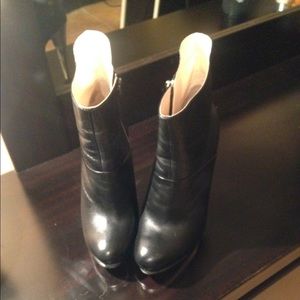 Leather high heeled platform ankle boots