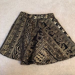 Necessary clothing black and gold patterned skirt