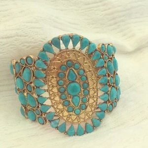 Blue and gold emblem bracelet