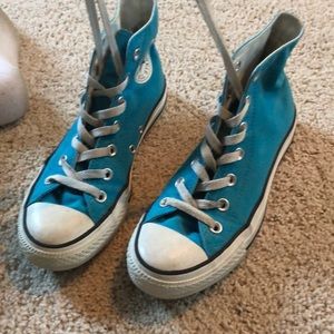 Blue Converse hightops